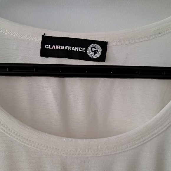 Polyester, tropical print top from Claire France. It has 3/4 sleeves and is size - Picture 3 of 4